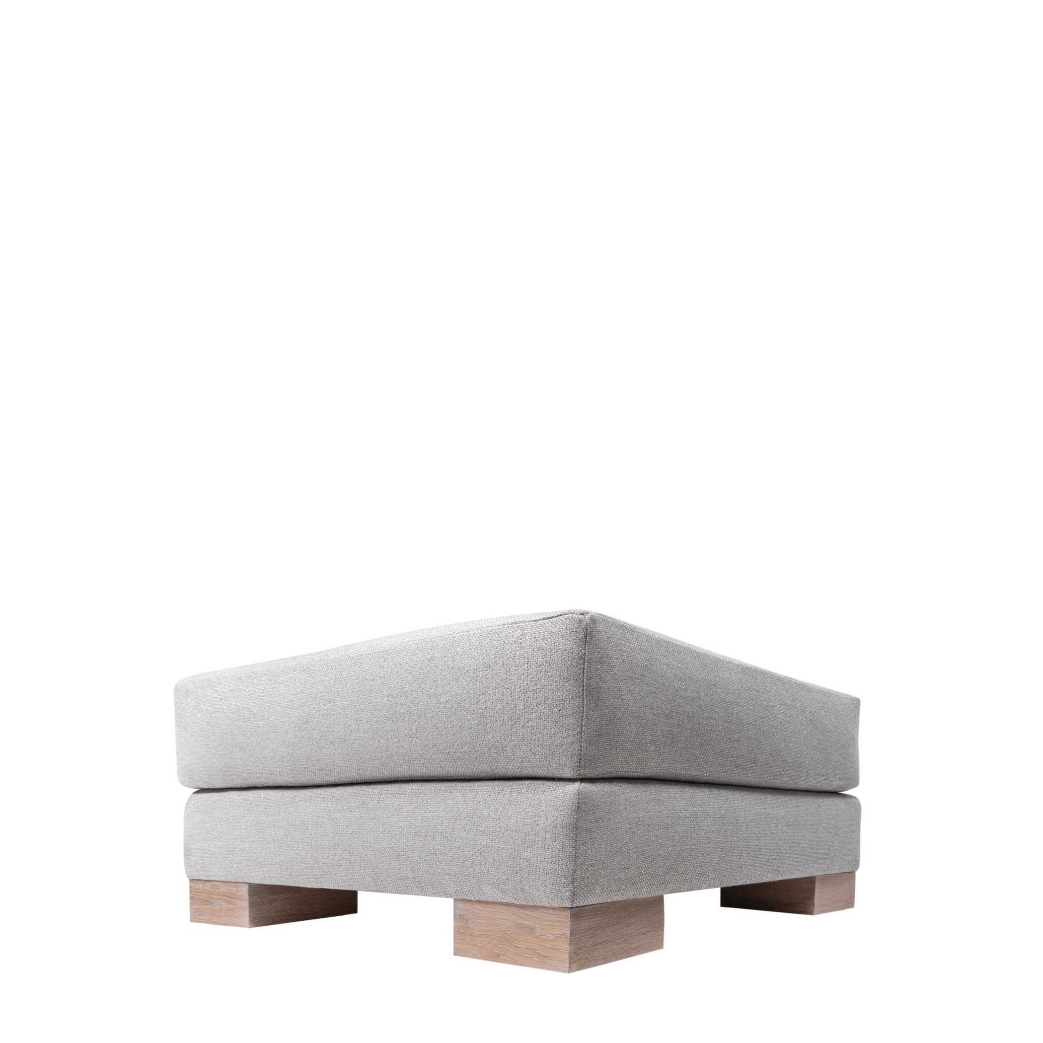 Ashley Yeates, sustainable design leader, presenting the signature Tucker Ottoman, an eco-friendly furniture piece that combines stylish design with sustainable materials, perfect for modern living spaces