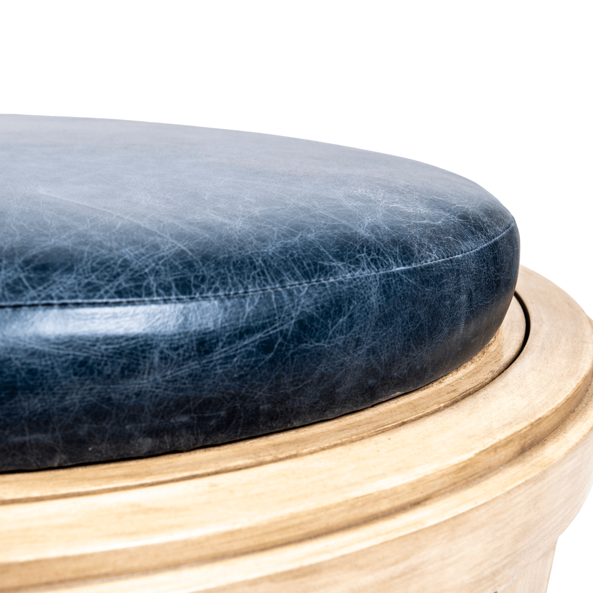 Ashley Yeates, renowned interior designer and sustainable leader, presenting the signature Lindsay Ottoman, a stylish and eco-friendly furniture piece crafted from sustainable materials