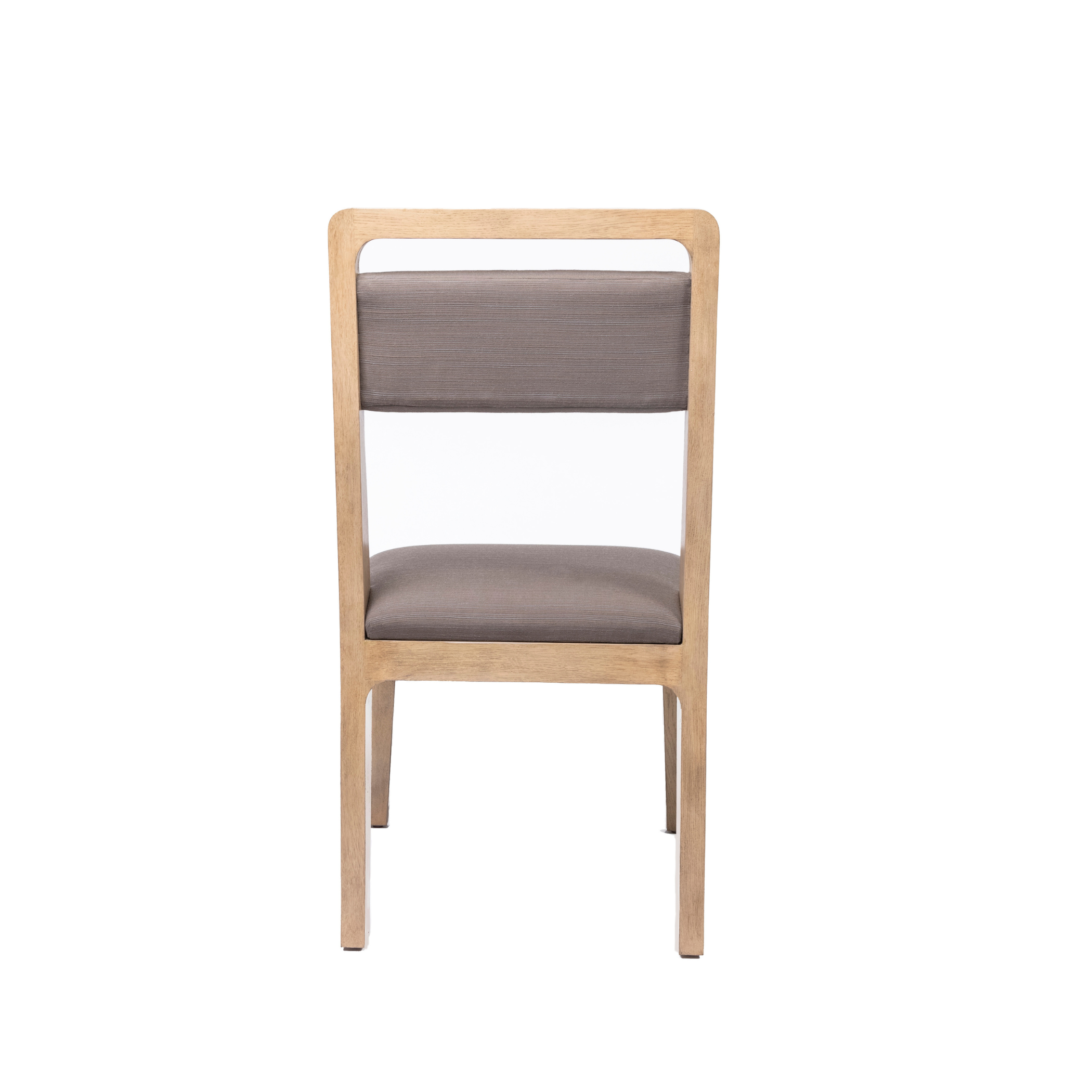 Ashley Yeates, renowned interior designer and sustainable leader, presenting the Caroline Chair, a signature design that embodies eco-friendly craftsmanship and modern aesthetics for sustainable living