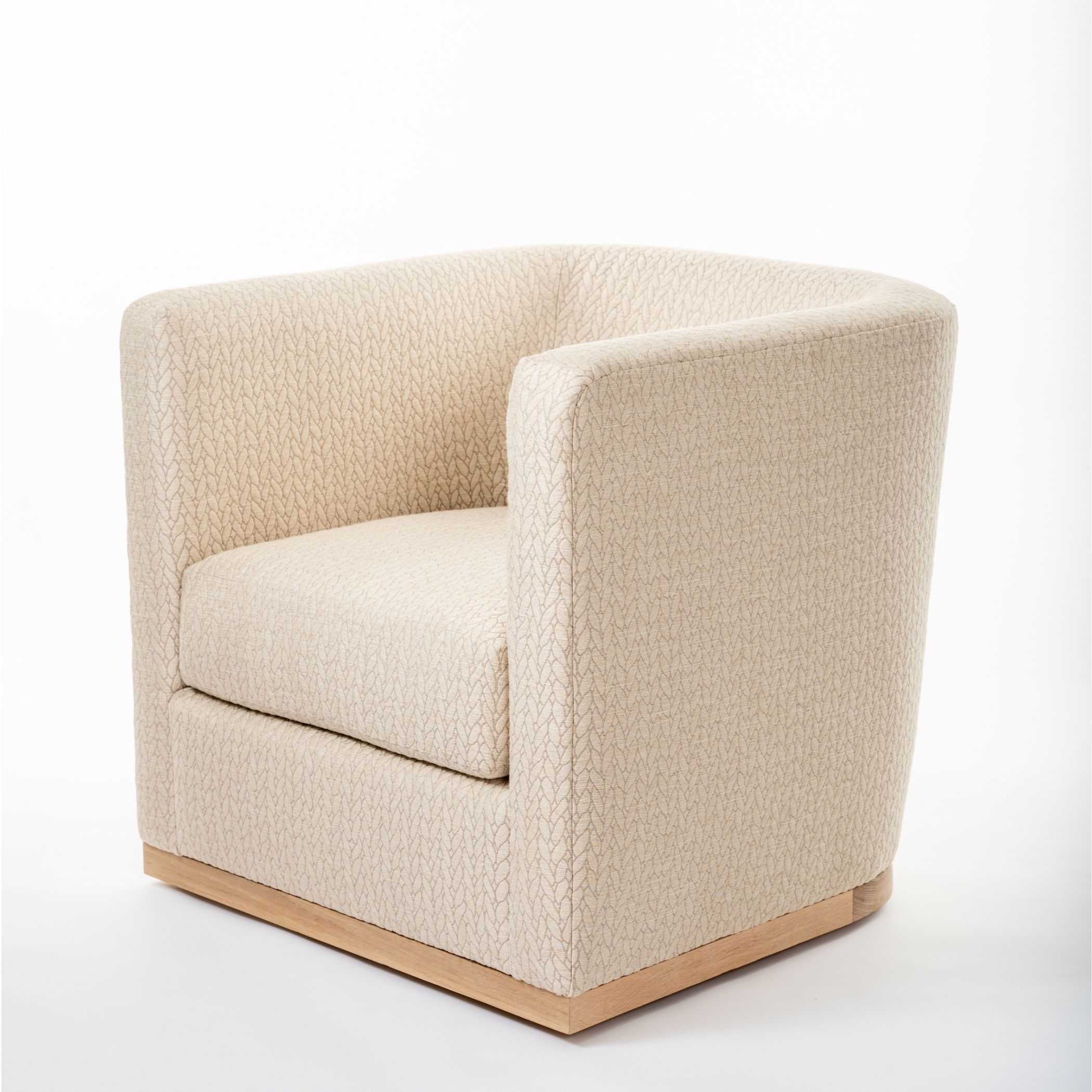 Ashley Yeates, renowned interior designer and sustainable leader, presenting the Gary Swivel Chair, a signature piece that combines contemporary style with eco-friendly materials for sustainable living