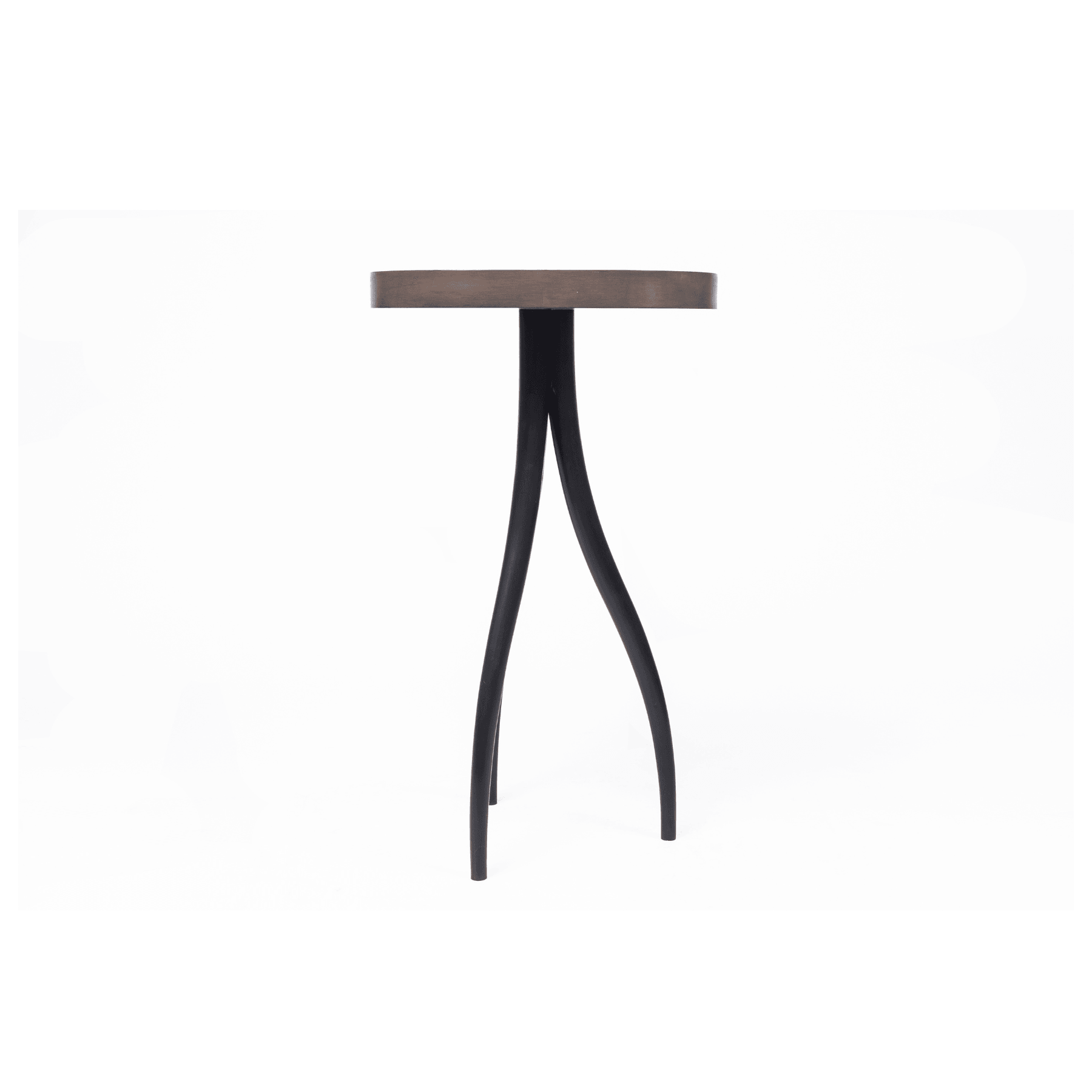 Ashley Yeates, renowned interior designer and sustainable leader, presenting the Audrey Side Table, a signature design crafted from eco-friendly materials, exemplifying stylish and sustainable living