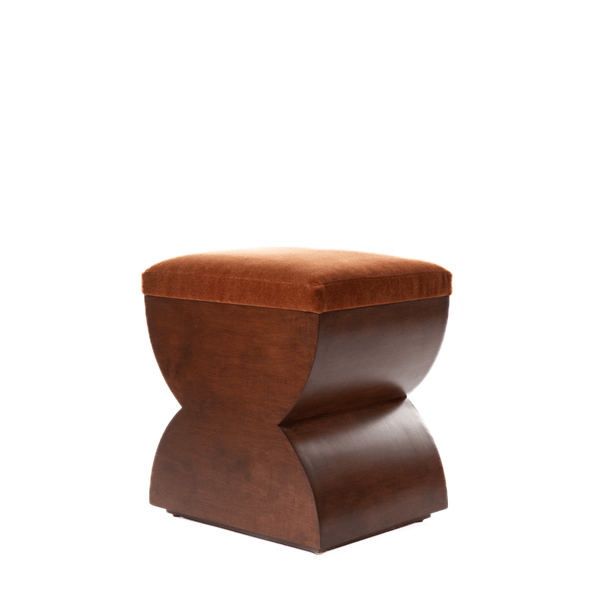 Ashley Yeates, renowned interior designer and sustainable leader, presenting the signature Hourglass stool, a stylish and eco-friendly design that enhances contemporary spaces while promoting sustainability