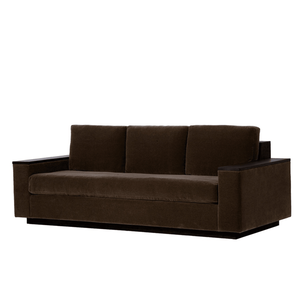 Ashley Yeates, renowned interior designer and sustainable leader, presenting the Bolton Sofa, a signature design that combines elegance with eco-friendly materials, perfect for stylish, sustainable living