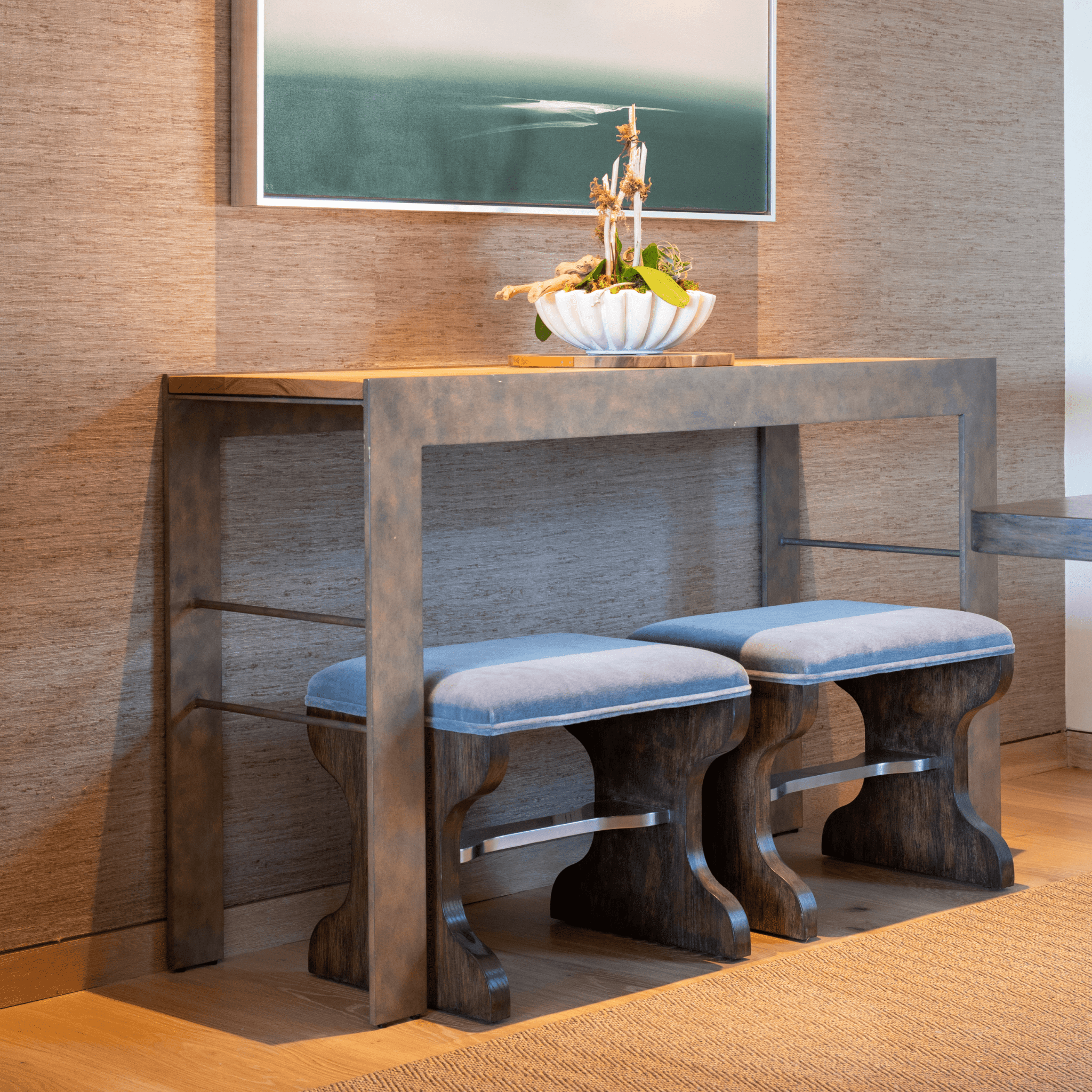 Ashley Yeates, renowned interior designer and sustainable leader, presenting the Clift console with a wood top and Jesse bench in a stylish interior setting. Showcases a blend of modern design and eco-friendly materials for sustainable living